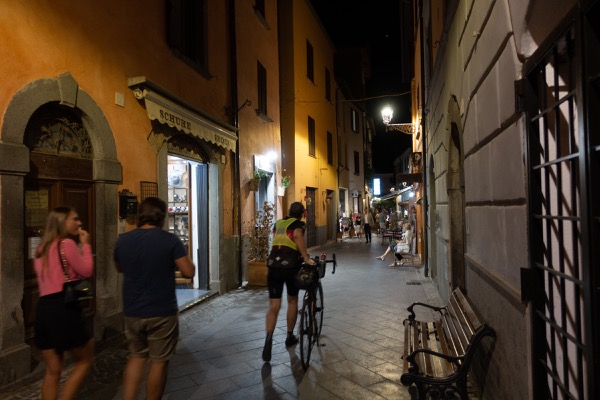 Robert searching for an open restaurant around 11:00 pm in the city of Bolsena