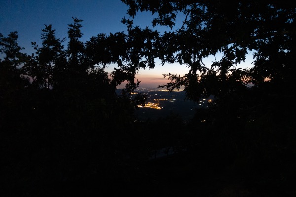 The lights of the nearby cities during the climb up to Vallombrosa — 1000km in the saddle